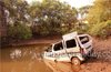 Car rolls into Gurupur river ; driver escapes with minor injuries